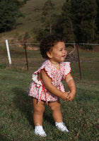 Load image into Gallery viewer, Cherry Floral Frill Bow Romper (pre order) - Fox Baby &amp; Co

