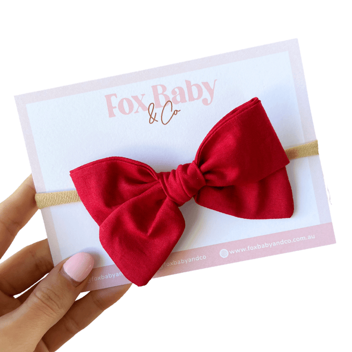 Red large pinwheel bow - Fox Baby & Co
