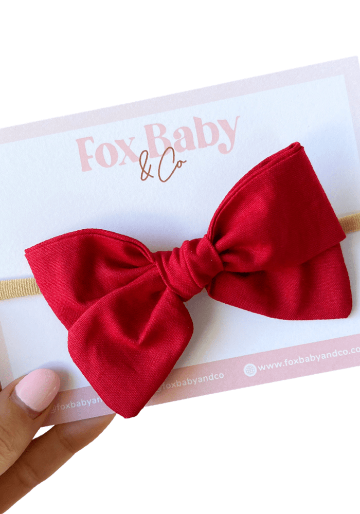 Red large pinwheel bow - Fox Baby & Co